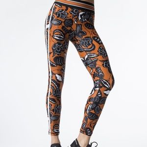 The upside orange floral leggings size large